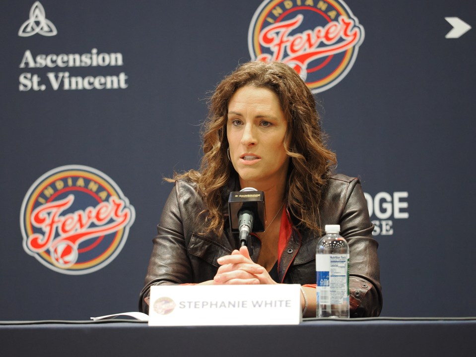 Stephanie White talks to the media during her introductory press conference